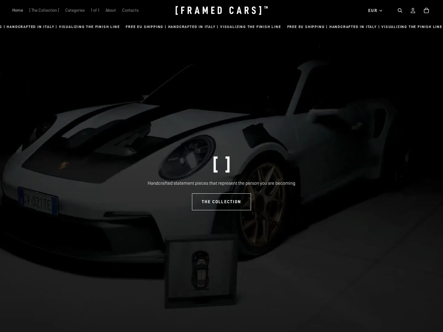 La home di Framed Cars: una Porsche 911 GT3 bianca con davanti il suo modellino in scala incorniciato.